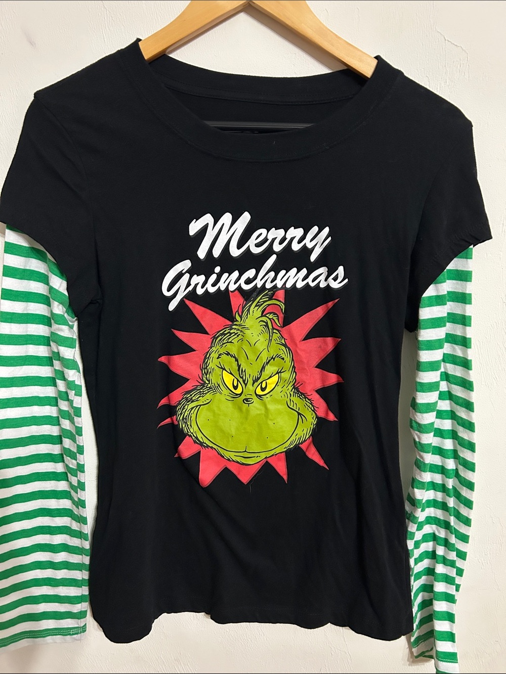 Dr. Seuss Black Tee with Green Grinch Graphic and Green/White Striped Sleeves